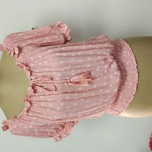 Pink top with white polka dots